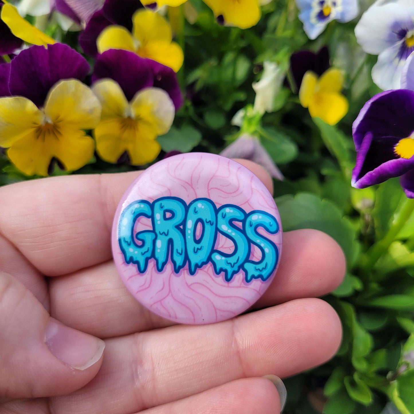 GROSS Button